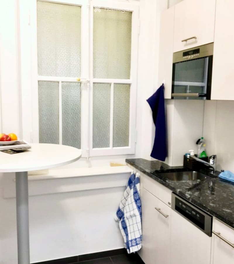 Kitchen with counter, sink, microwave, dishwasher, dishwasher