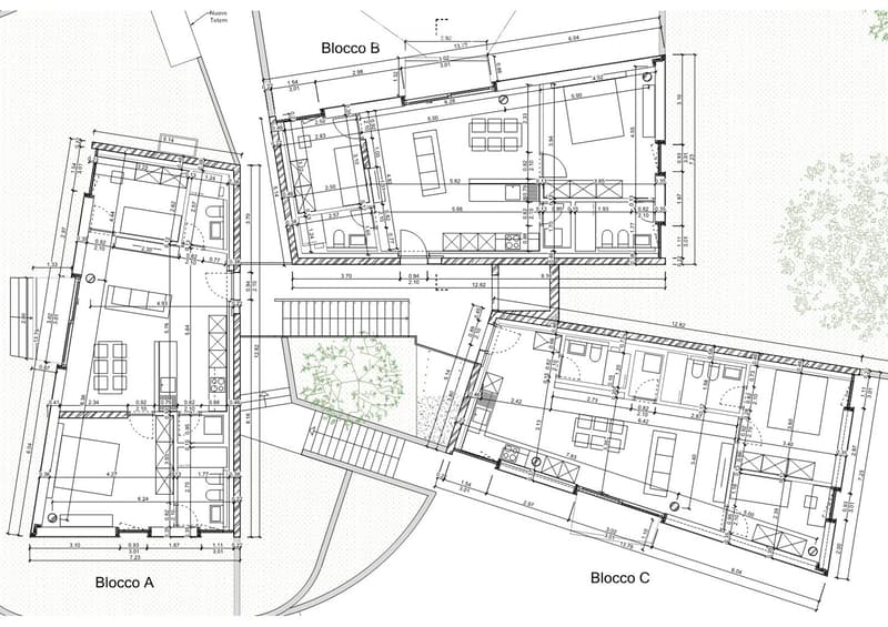 Floor plan of three building blocks (Blocco A, Blocco B, Blocco C) with labeled dimensions, rooms, and structural details.