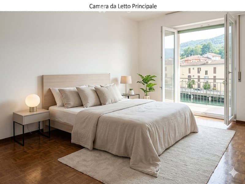 Modern bedroom with a large bed, nightstands, lamps, and a view of the city through large windows.