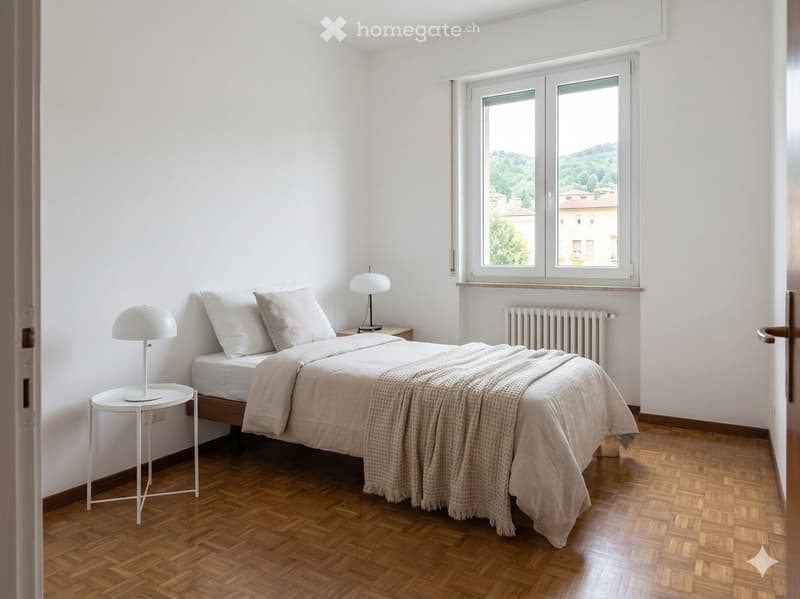 Minimalist bedroom with a wooden floor, white walls, a single bed with pillows and a blanket, a nightstand with a lamp, and a small side table with another lamp.