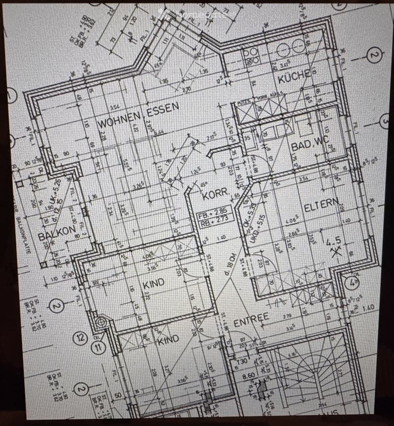 Floor plan showing a residential layout with labeled rooms including living/dining area, kitchen, bathroom, balcony, children's rooms, and entrance.