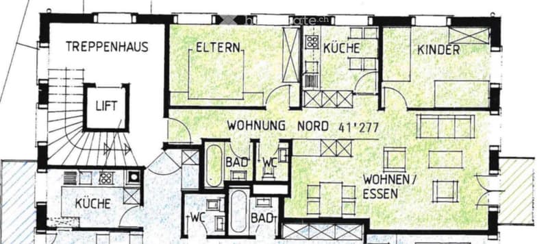 Floor plan of a multi-level residential building with labeled rooms including kitchen, bathrooms, living/dining area, bedrooms, and a staircase house.