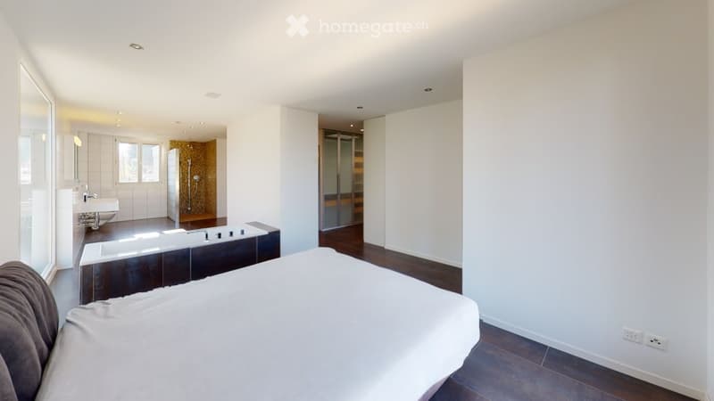 spacious, well-lit, modern design, double bed, bathtub, white walls, wooden floor