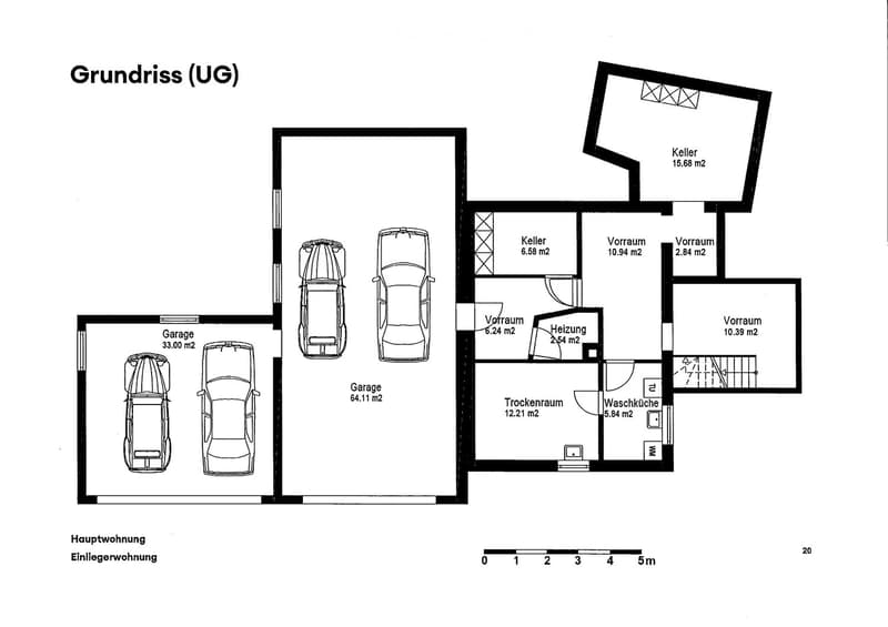 Floor plan of a basement level showing two garages, storage areas, utility room, and heating room.