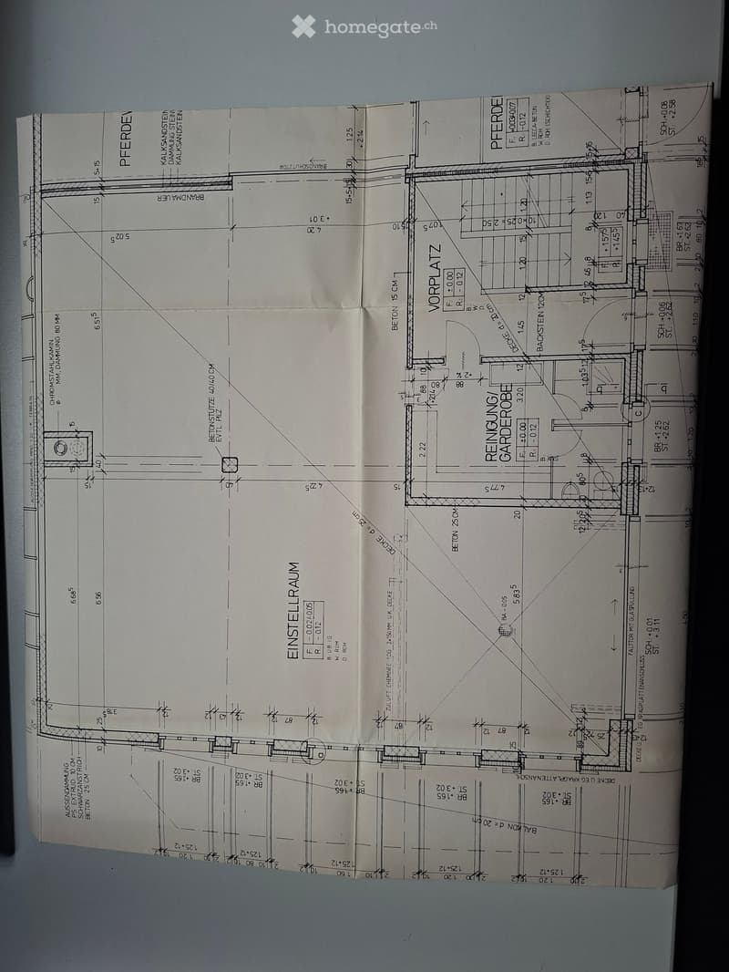Architectural floor plan showing a multi-room layout with labeled areas including a living room, kitchen, bedrooms, bathrooms, and a balcony.