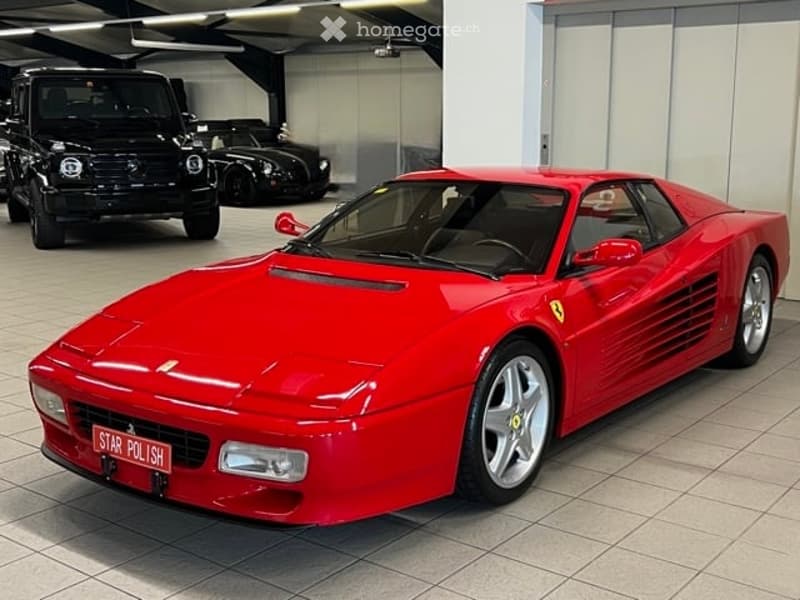 {"visible_features": ["Garage"], "type": "Garage", "objects": [], "description": "Garage with a red Ferrari and a black SUV, clean and organized with tiled flooring and white walls.", "localized_descriptions": {"EN": "Garage with a red Ferrari and a black