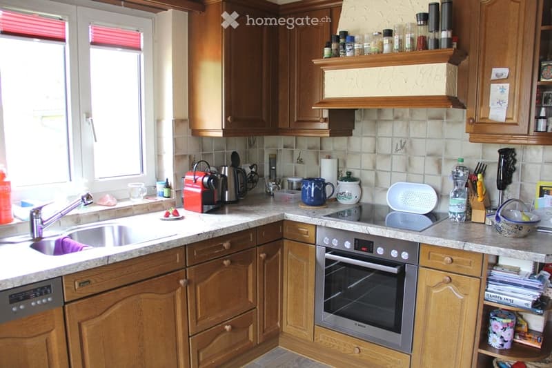 {"type": "Kitchen", "objects": ["sink", "faucet", "oven", "dishwasher", "coffee maker", "cup", "bottle", "oven", "cupboard", "fridge", "cupboard", "cupboard", "cupboard", "cupboard", "cupboard", "cupboard", "cupboard", "cupboard", "cupboard", "cupboard",