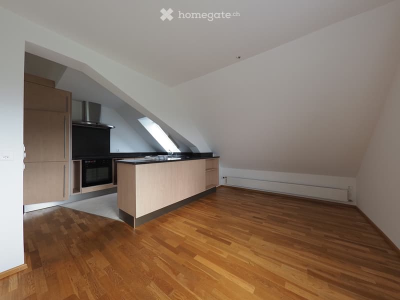 kitchen with wooden floor, wooden cabinets, black appliances, skylight