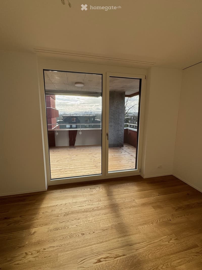 empty room, sliding glass doors, wooden floor, balcony, city view