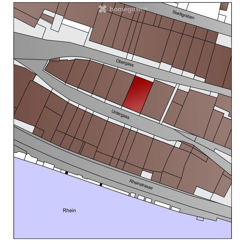 Floor plan showing a building layout with labeled streets: Stadtgraben, Obergass, Untergass, and Rheinstrasse, with the Rhein river visible at the bottom.