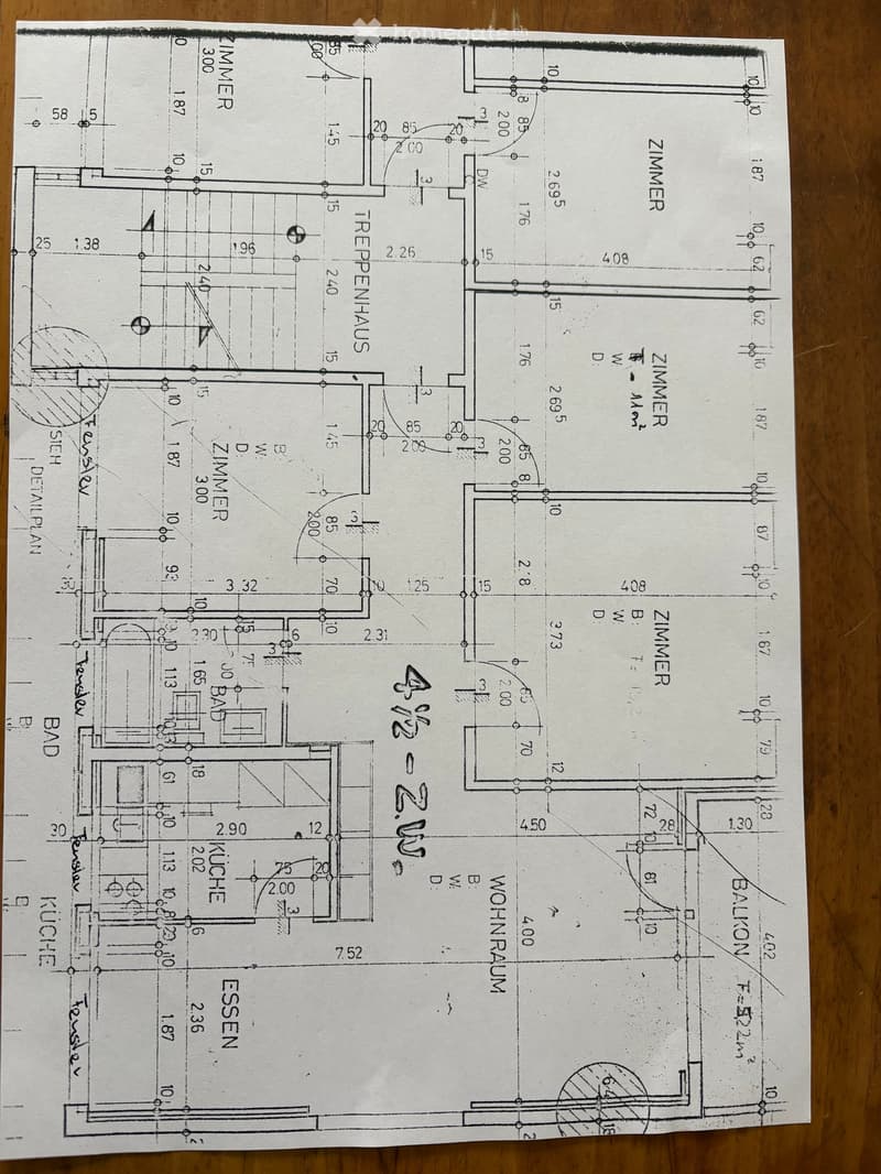 Floor plan showing a living room, kitchen,3 bedrooms, 2 bathrooms, and a balcony.