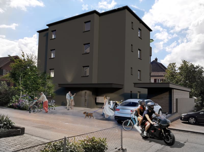 Multi-story building, dark gray facade, three windows per floor, entrance with an archway, person in a wedding dress, person in a wheelchair, bicycle, parked car, plants, paved walkway