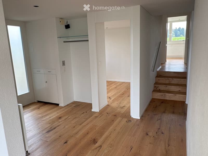 empty room, wooden floor, white walls, glass door, wooden stairs