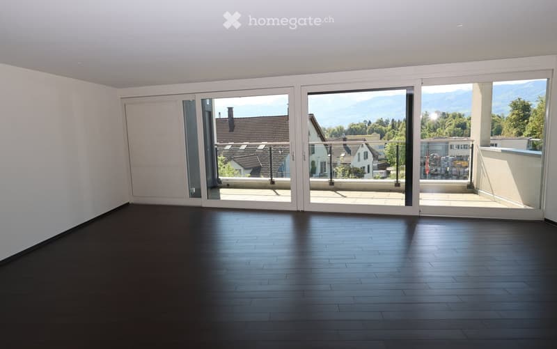 empty room, large sliding glass doors, balcony, wooden floor, white walls