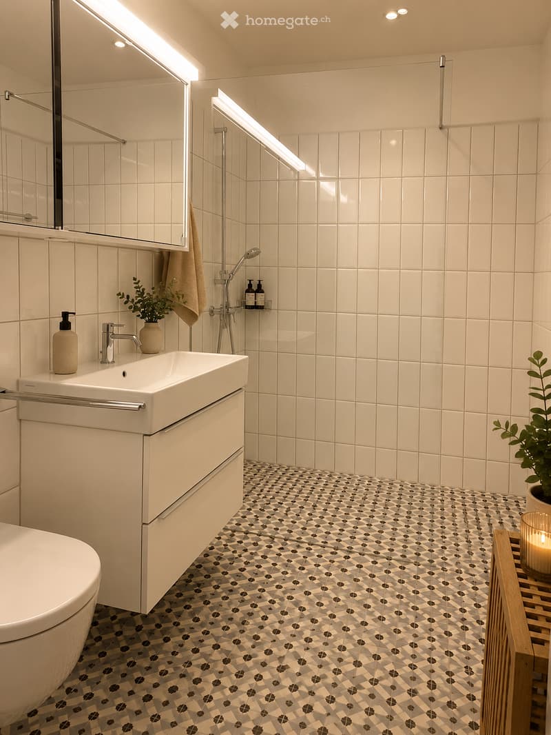 Modern bathroom with white tiles, geometric patterned floor, sink with faucet, mirror, towel, bathtub, and small plant on a shelf.