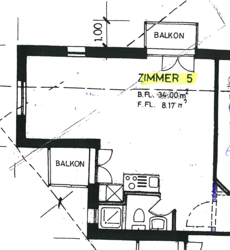 Floor plan showing a room labeled "ZIMMER 5" with dimensions, two balconies, and a small kitchenette area.