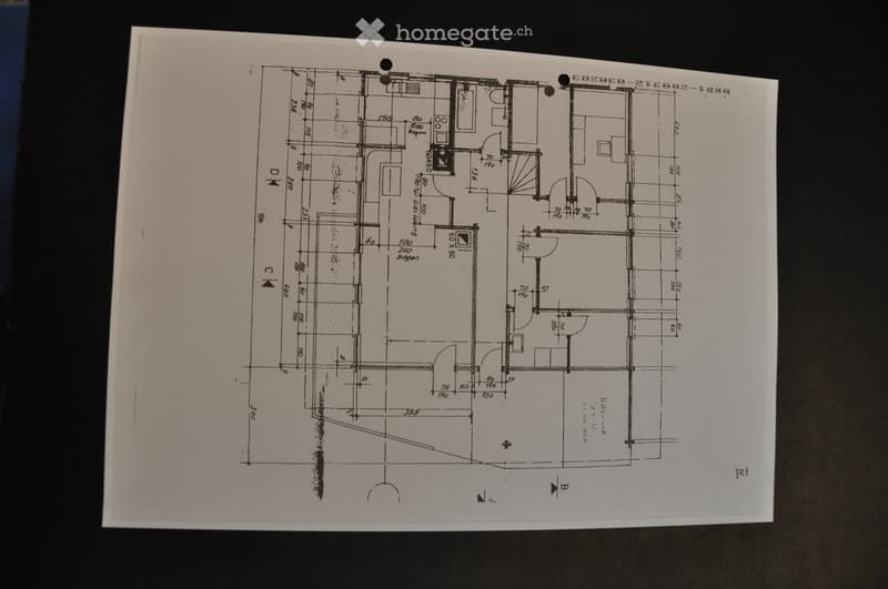 Floor plan of a residential space with labeled dimensions, including a living area, kitchen, bedrooms, and bathrooms.