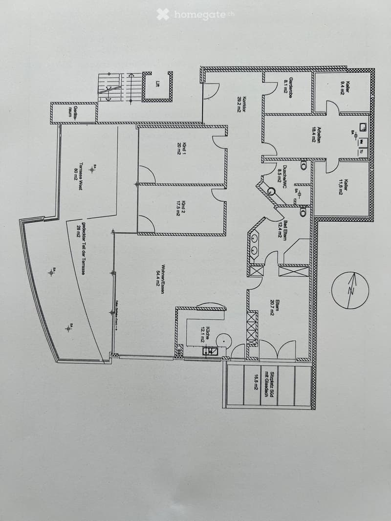 Floor plan showing a multi-room layout including a kitchen, two bedrooms, living room, hallway, and several storage areas.