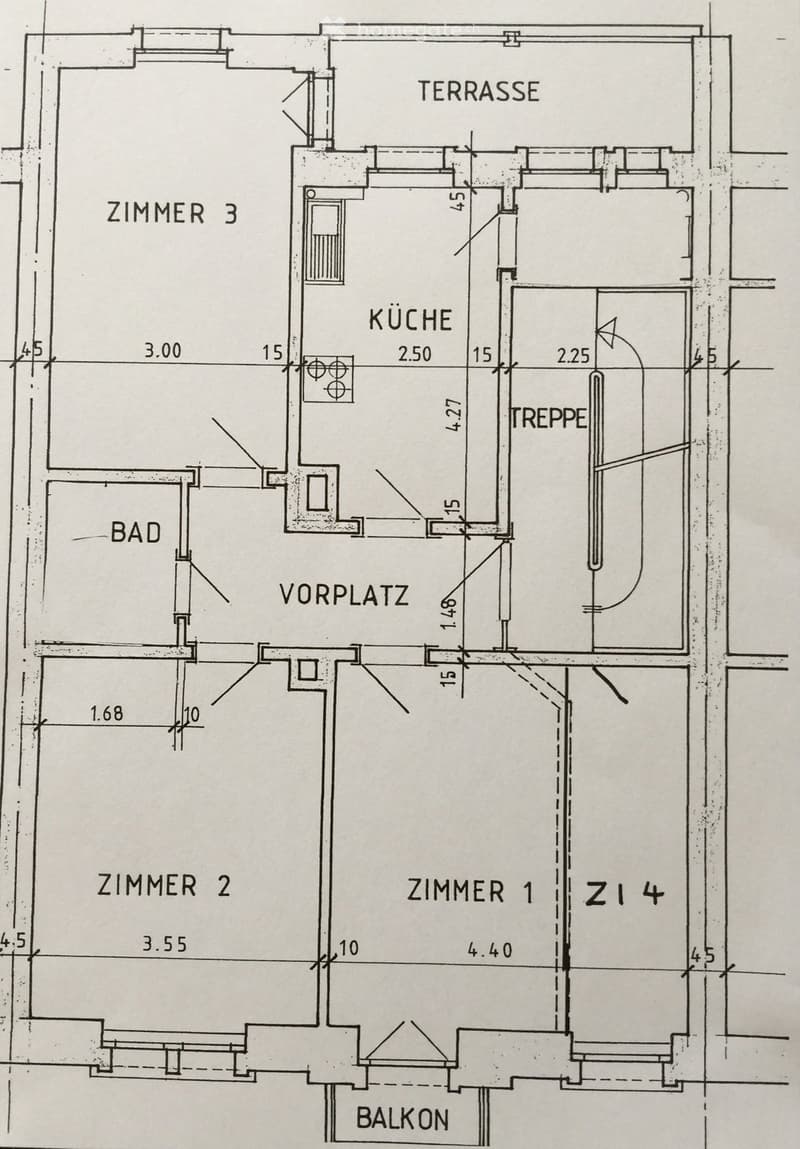 Floor plan showing a kitchen, three bedrooms, a bathroom, a hallway, a balcony, and a terrace.