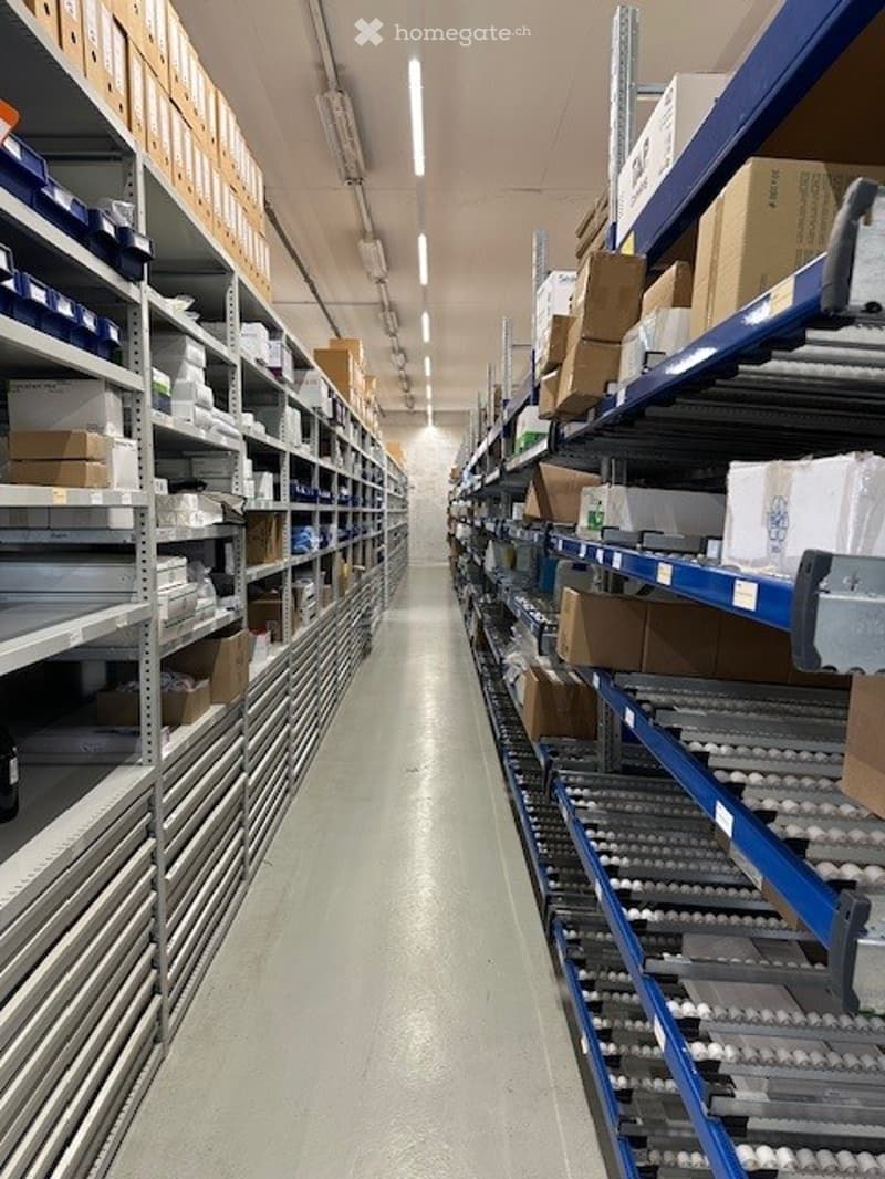 empty warehouse with many shelves and boxes, metal structures, metal rack