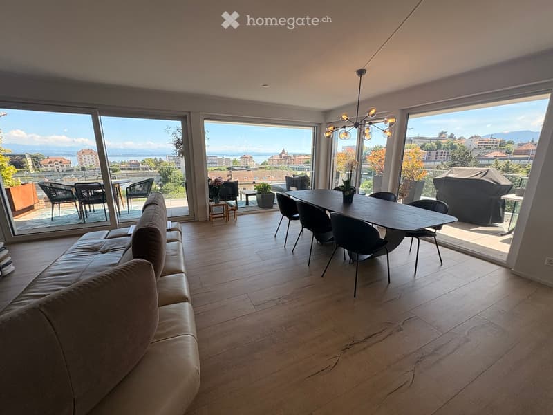 {"visible_features": ["View"], "type": "Furnished Room", "objects": ["sofa", "dining table", "chair", "table", "chair", "chair", "chair", "chair", "chair", "chair", "chair", "chair", "chair", "chair", "chair", "chair", "chair", "chair", "chair", "chair",