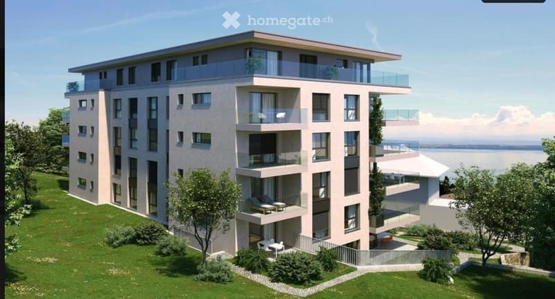 Modern multi-story residential building with balconies, large windows, and a scenic waterfront view.