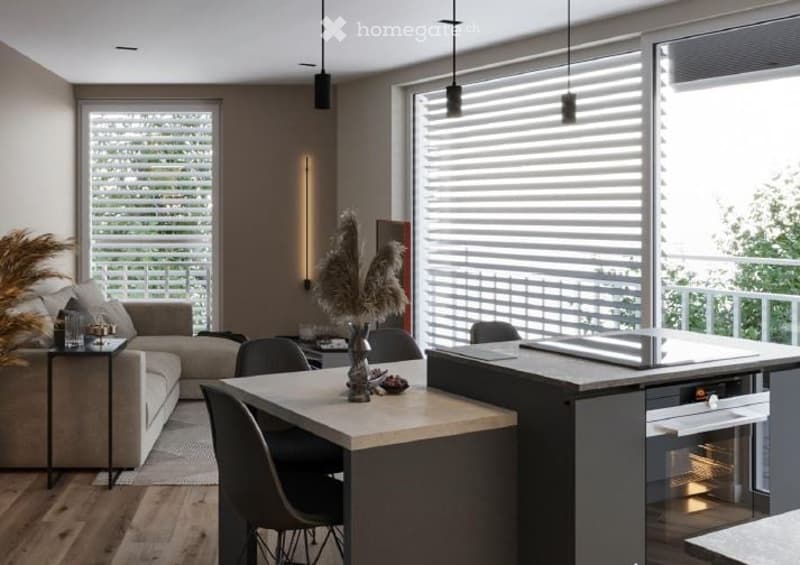 open plan living room, large windows with shutters, balcony, kitchen with oven, dining table, sofa, side table