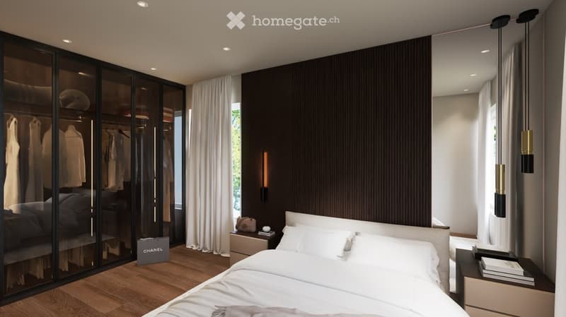 Modern bedroom with a large bed, sleek wardrobe with mirrored doors, nightstand with lamp, and a view of greenery through large windows.