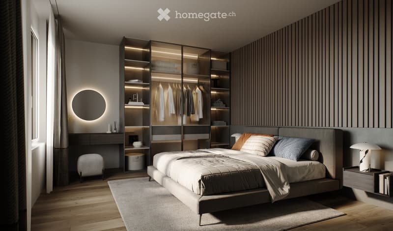 Modern bedroom with a large bed, nightstand, lamp, wardrobe with built-in lighting, and a sleek desk area.