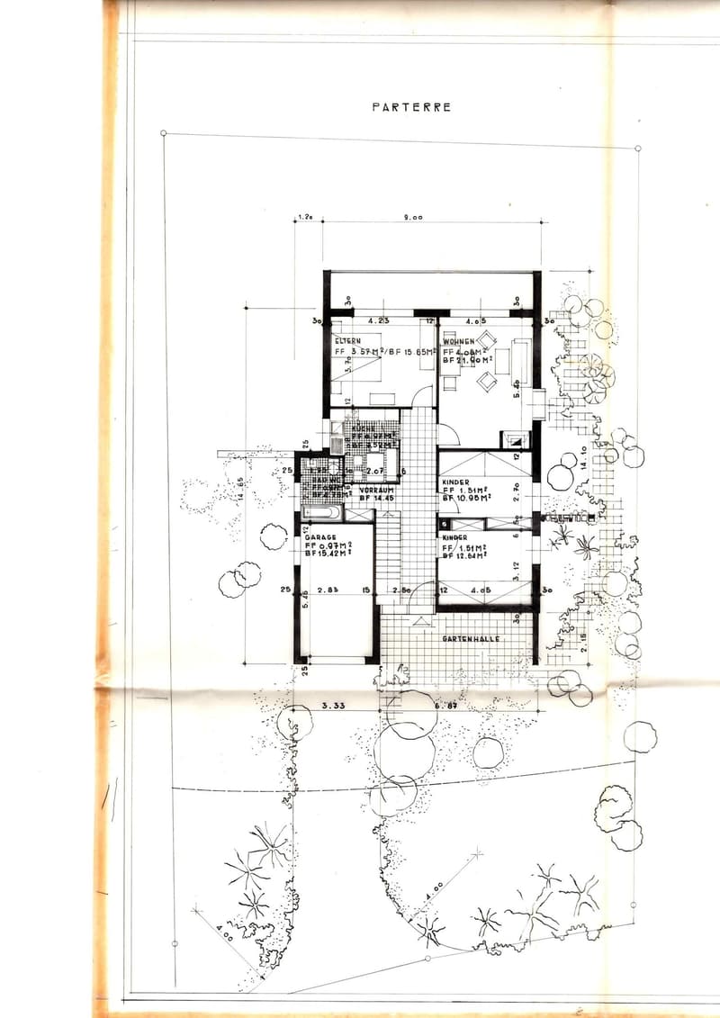 Floor plan of a house with labeled rooms including living room, kitchen, bedrooms, bathrooms, garage, and garden hall.