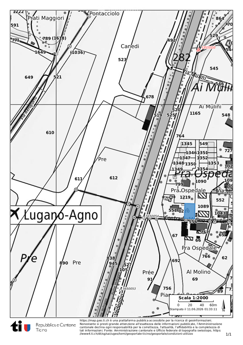 Floor plan of a residential area in Lugano-Agno, showing streets, buildings, and property boundaries.