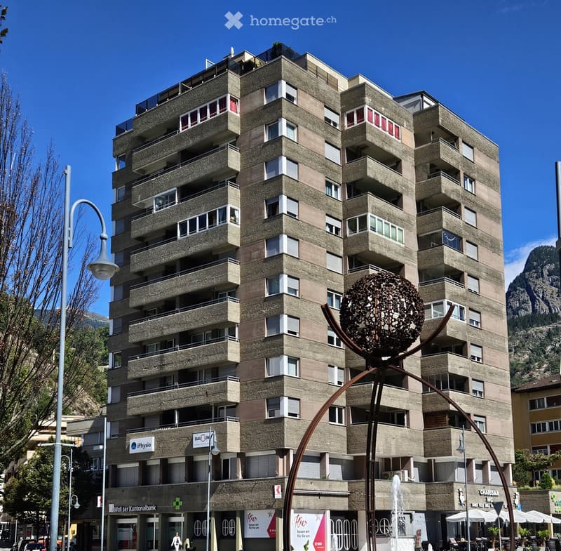 Apartment building with many balconies, windows, modern architecture