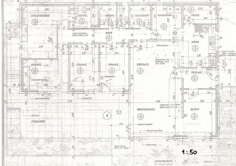 Floor plan showing multiple rooms including living room, kitchen, bedrooms, bathrooms, and a terrace.