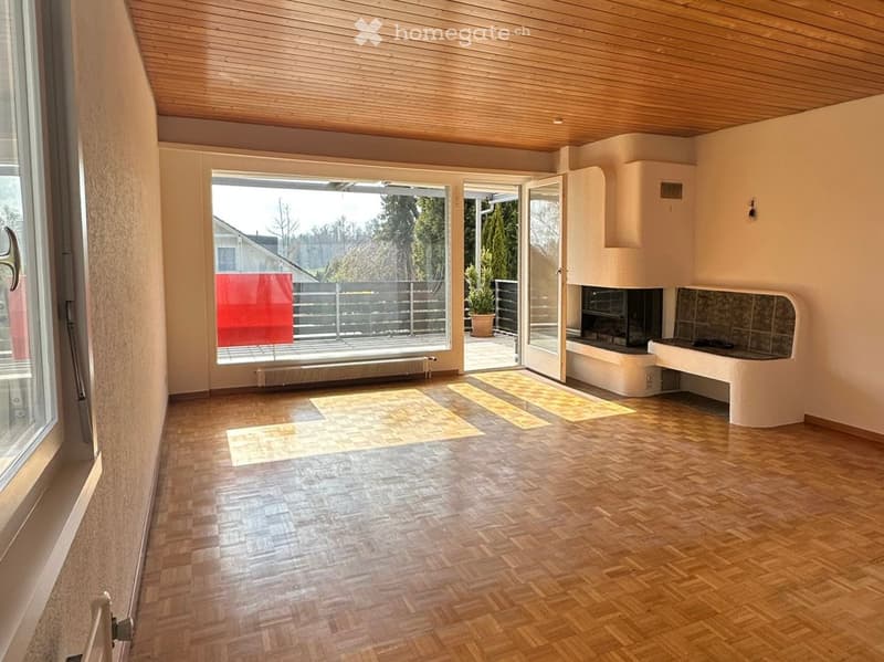 wooden floor, large windows, sliding doors to balcony, fireplace, radiator