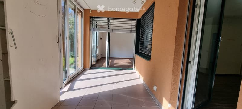 tiled floor, glass doors, balcony, white walls, power outlet