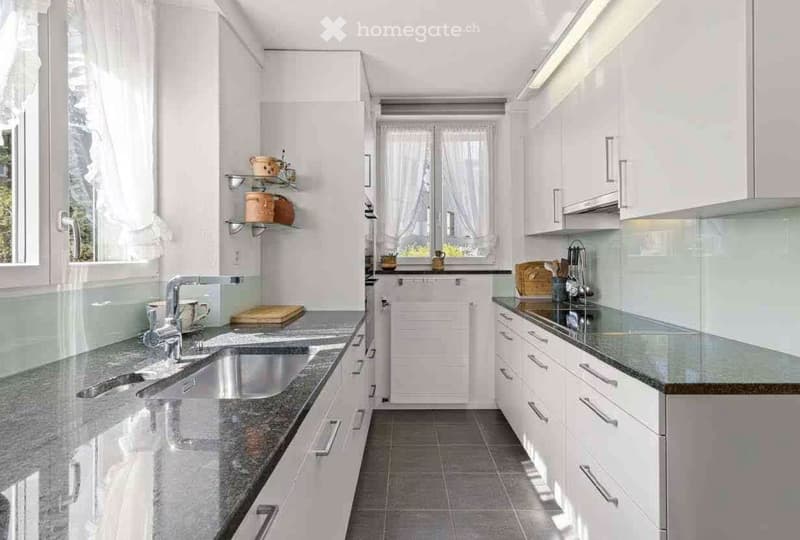 {"type": "Kitchen", "objects": ["sink", "faucet", "cabinets", "countertop", "cutting board", "cup", "faucet", "faucet", "faucet", "faucet", "faucet", "faucet", "faucet", "faucet", "faucet", "faucet", "faucet", "faucet", "faucet", "faucet", "faucet", "fauc