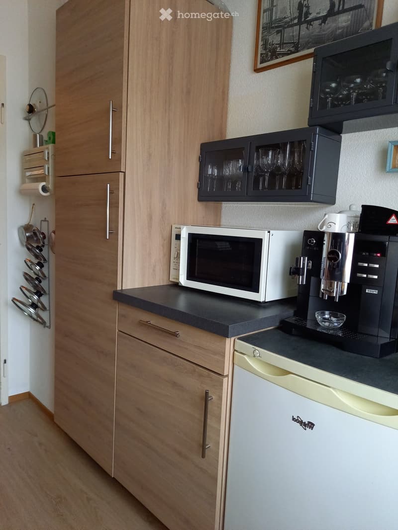 {"type": "Kitchen", "objects": ["microwave", "coffee maker", "cupboard", "fridge", "cupboard", "cupboard", "cupboard", "cupboard", "cupboard", "cupboard", "cupboard", "cupboard", "cupboard", "cupboard", "cupboard", "cupboard", "cupboard", "cupboard", "cup