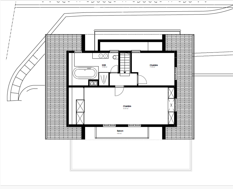 Floor plan showing a layout with two bedrooms, a bathroom, a living area, and a balcony.