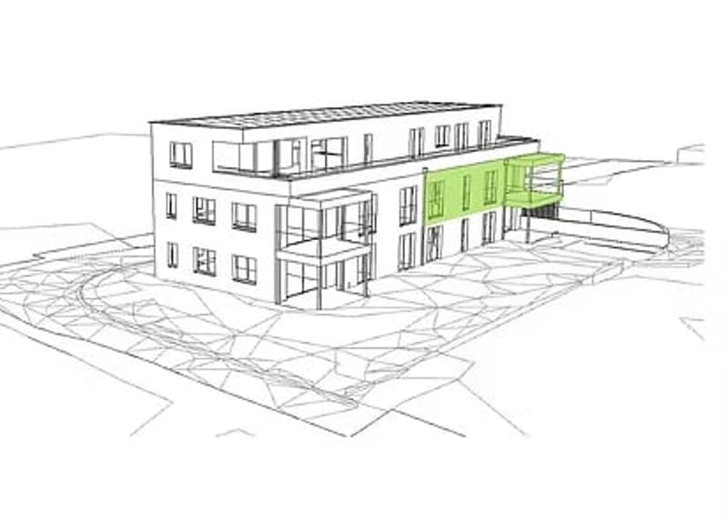 Architectural rendering of a modern multi-story building with a green accent wall and balcony areas.
