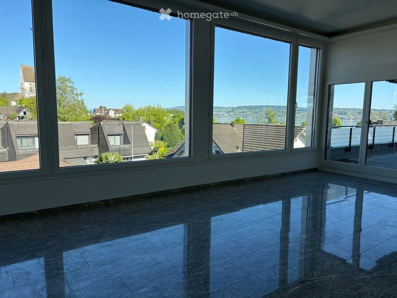 large windows, tiled floor, empty room, view of the city