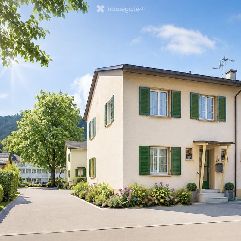 Two-story house with light beige walls, green shutters, and a well-maintained garden with colorful flowers and shrubs.