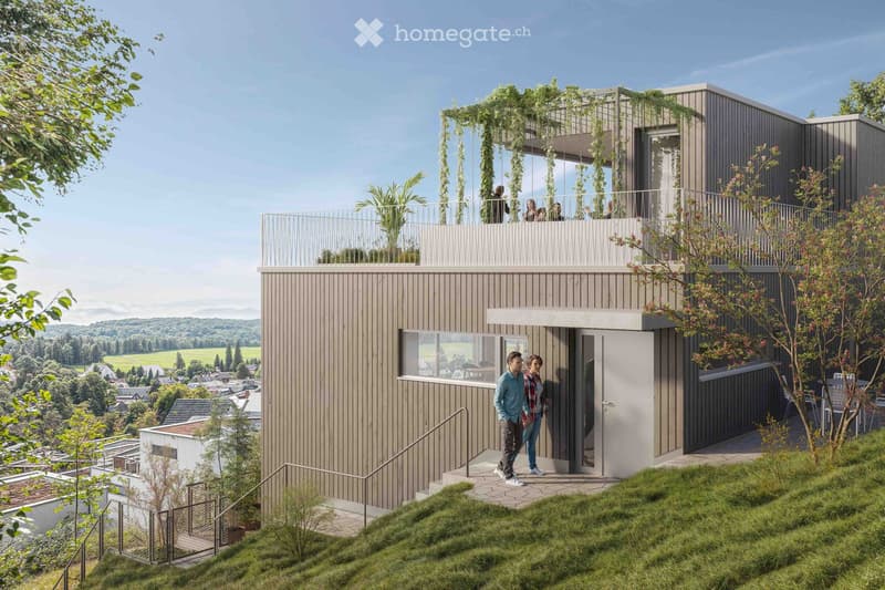Modern two-story house with wooden exterior, large windows, raised ground floor, balcony, and greenery on the roof.