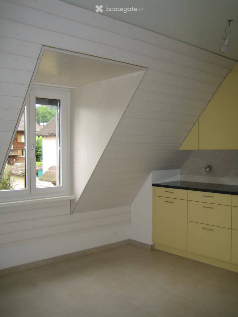 empty room, white walls, wooden ceiling, window, yellow cabinets, tiled floor