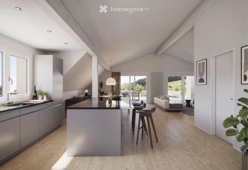 Open-plan kitchen and living area with modern design, featuring a central island, bar stools, a sofa, and large windows letting in natural light.