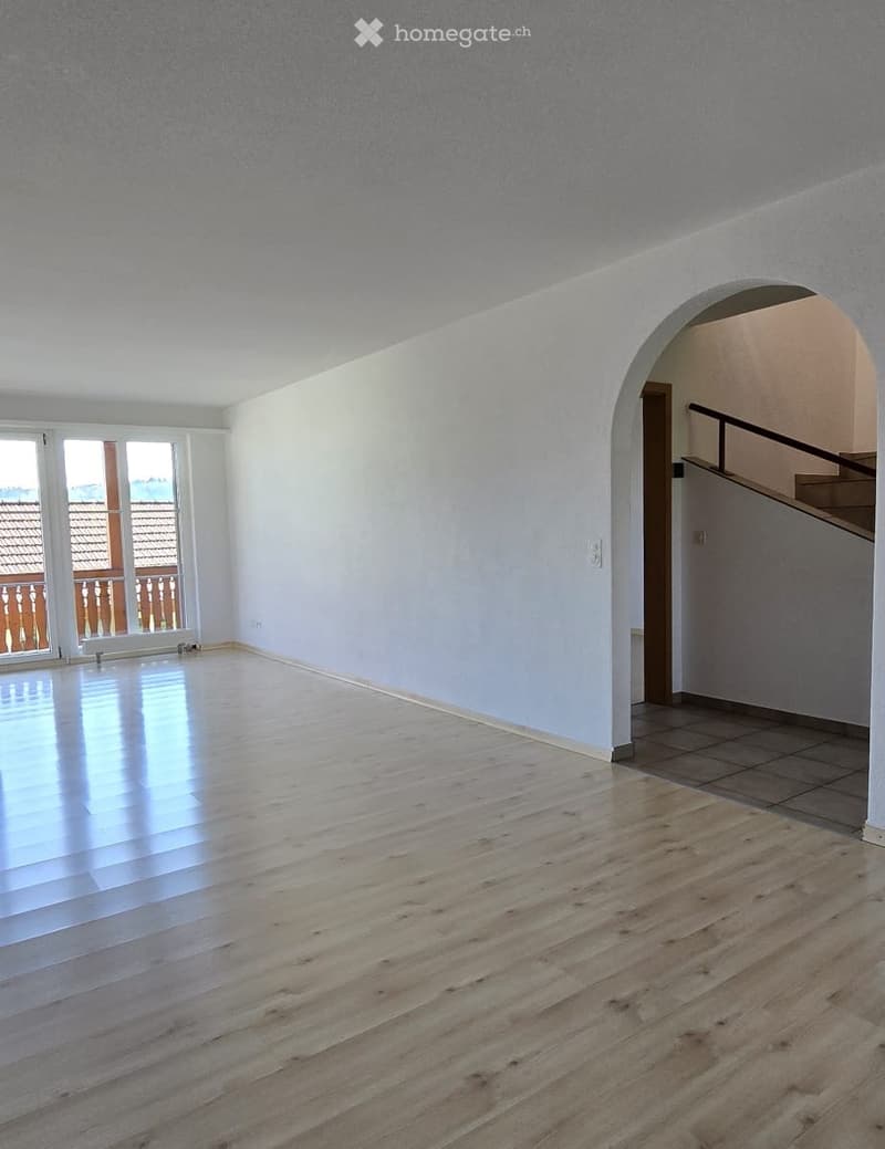 empty room, wooden floor, white walls, large windows, balcony, staircase