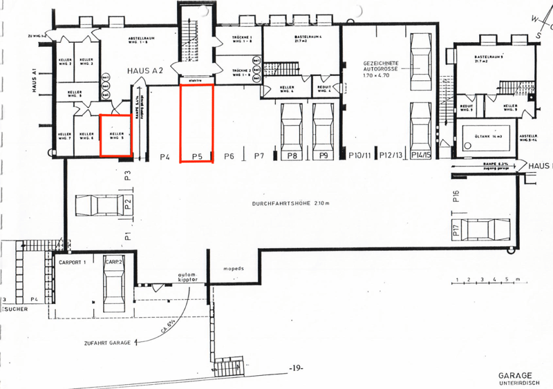 Floor plan of a multi-unit building with labeled rooms including basements, storage areas, and parking spaces. Includes Haus A1 and Haus A2, carports, and access ramps.