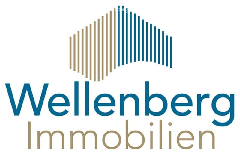 Logo of a real estate company, featuring stylized vertical bars in blue and brown, with the text "Wellenberg Immobilien" in blue and brown.