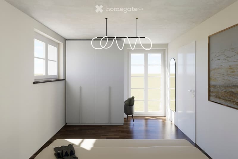 Modern, minimalist bedroom with white walls, wooden flooring, large windows, a bed with a grey blanket, a wardrobe, a small cactus on a stool, a mirror, and a painting on the wall.