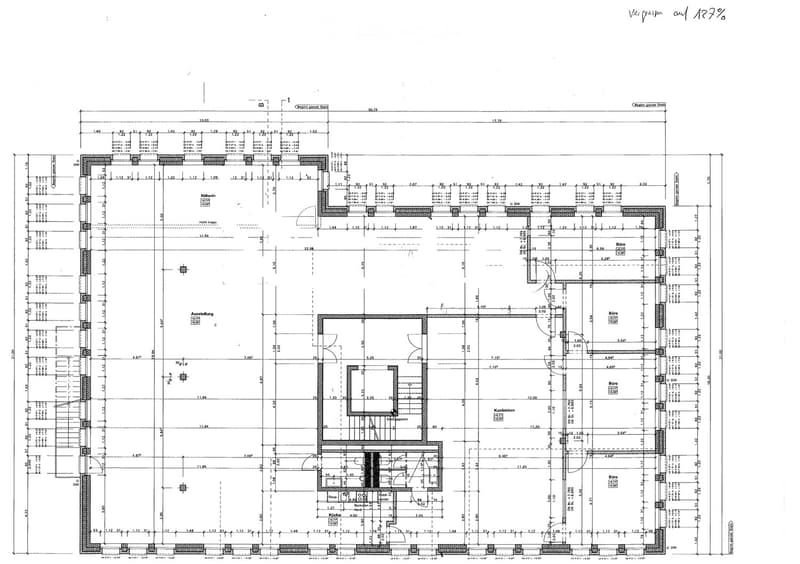 Floor Plan. Floor plan of a commercial building with multiple rooms including offices, a kitchen, a conference room, and a restroom. Dimensions and room labels are clearly marked.