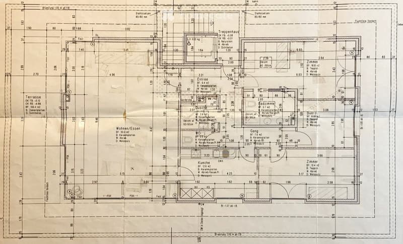 Floor plan of a multi-room residential building, including living/dining area, kitchen, bedrooms, bathrooms, hallway, and staircase.